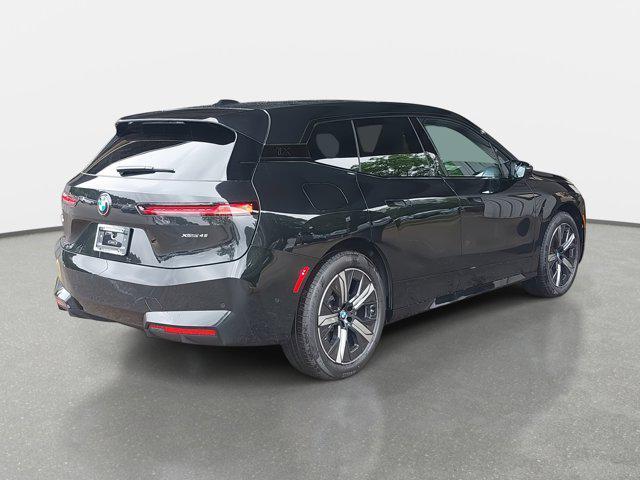 new 2026 BMW iX car, priced at $84,725