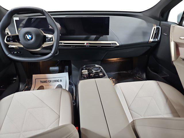 new 2026 BMW iX car, priced at $87,325