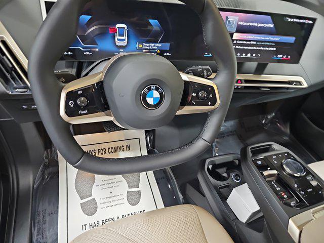 new 2026 BMW iX car, priced at $87,325