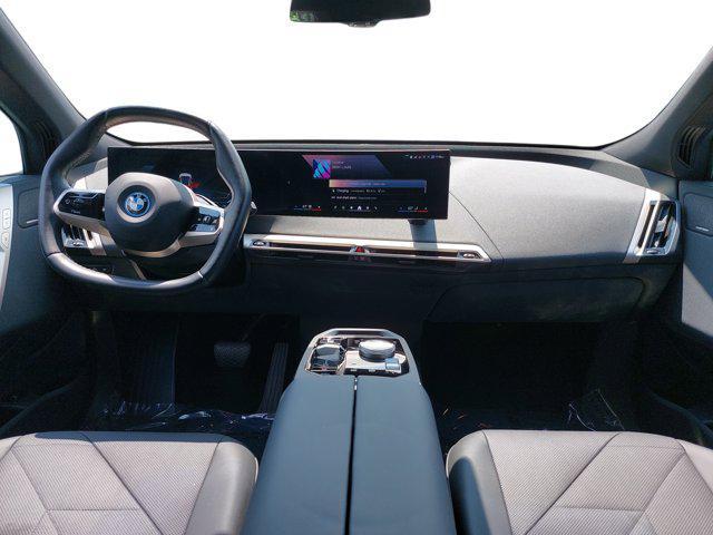 used 2024 BMW iX car, priced at $65,482
