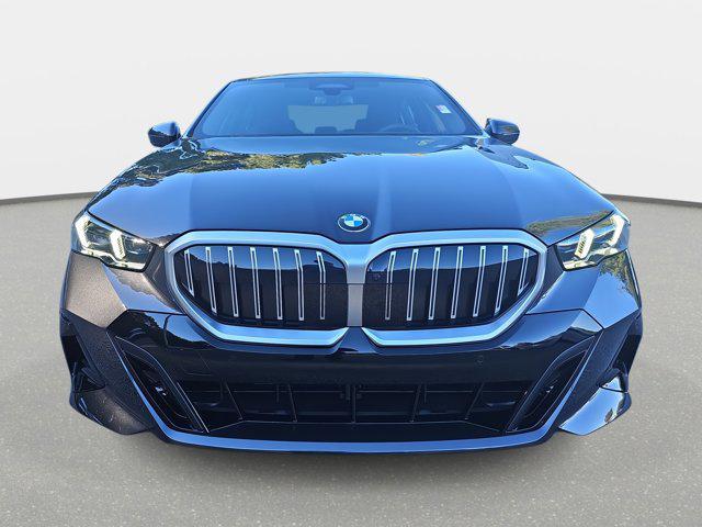 new 2025 BMW 530 car, priced at $70,275