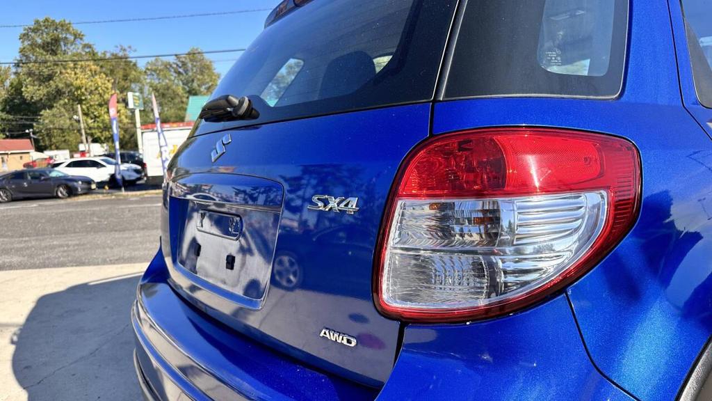 used 2012 Suzuki SX4 car, priced at $4,399