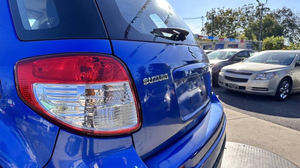 used 2012 Suzuki SX4 car, priced at $4,399