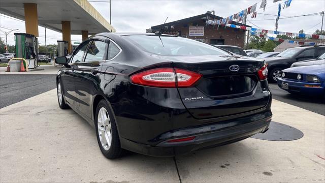 used 2013 Ford Fusion car, priced at $7,900