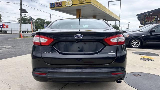 used 2013 Ford Fusion car, priced at $7,900