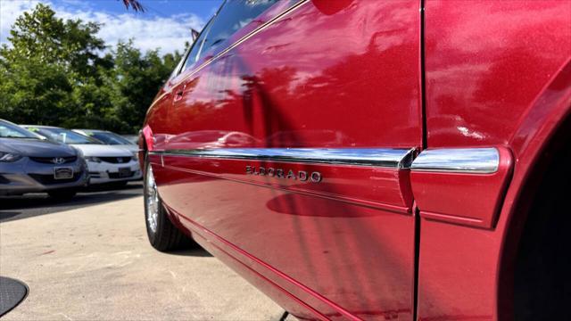 used 1999 Cadillac Eldorado car, priced at $5,999