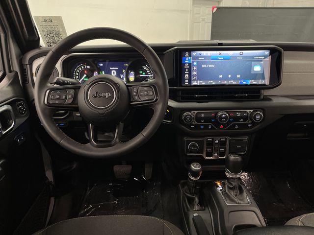 used 2024 Jeep Wrangler 4xe car, priced at $28,750