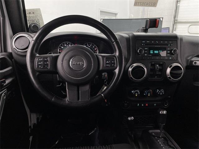 used 2011 Jeep Wrangler Unlimited car, priced at $14,287