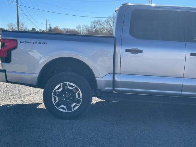 used 2023 Ford F-150 Lightning car, priced at $42,494