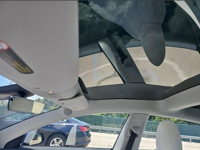 used 2022 Tesla Model 3 car, priced at $26,141