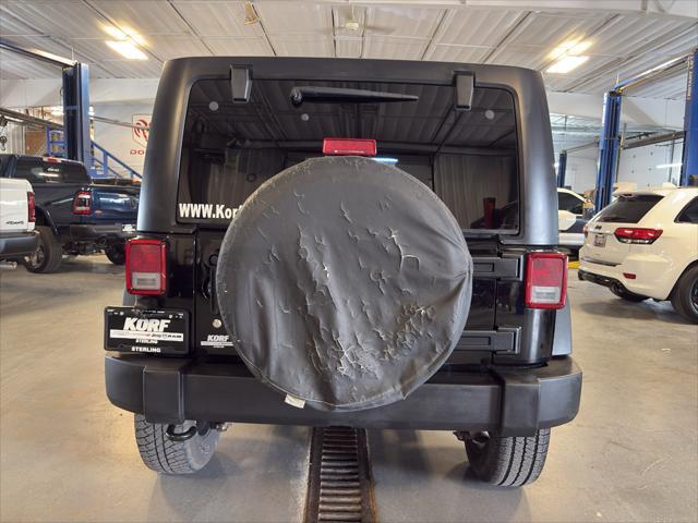 used 2011 Jeep Wrangler Unlimited car, priced at $11,562