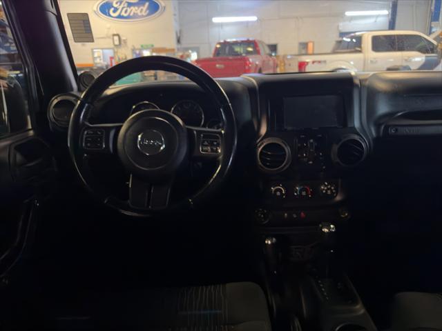 used 2011 Jeep Wrangler Unlimited car, priced at $11,562