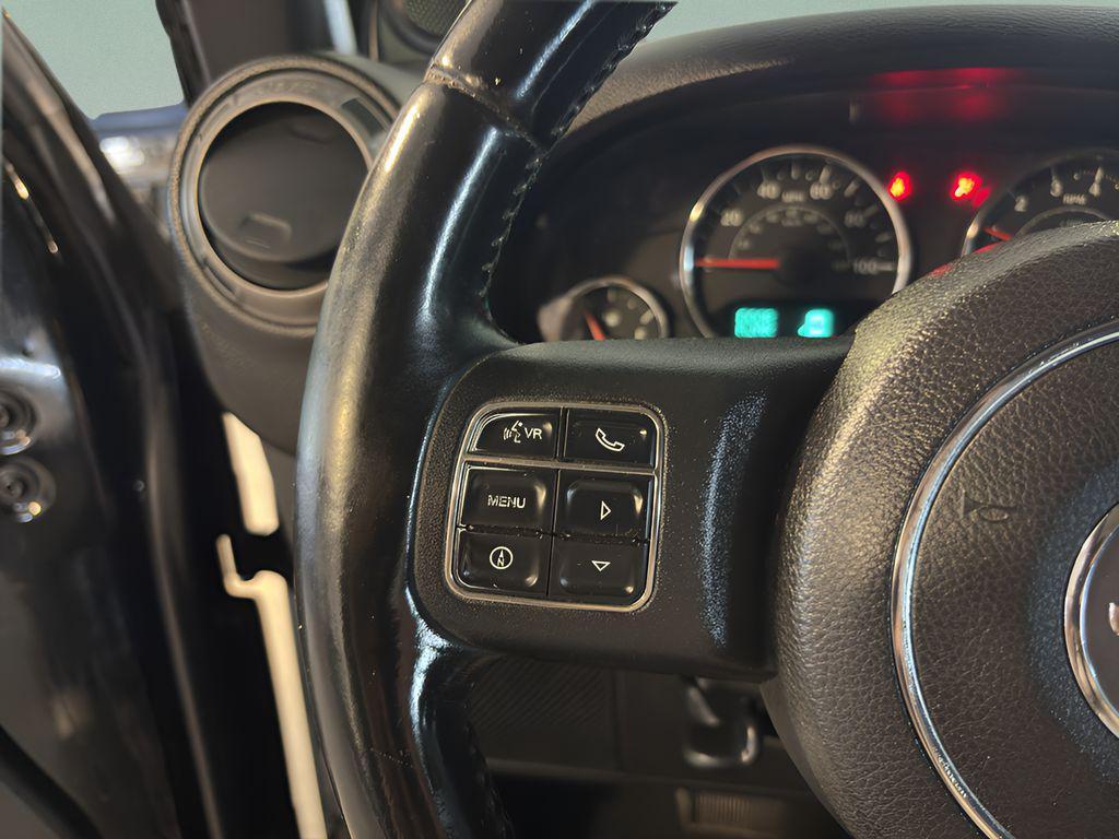 used 2011 Jeep Wrangler Unlimited car, priced at $13,494