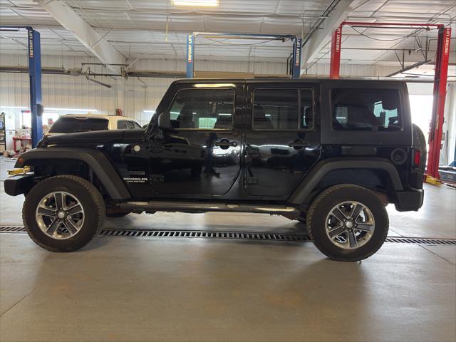 used 2011 Jeep Wrangler Unlimited car, priced at $11,562