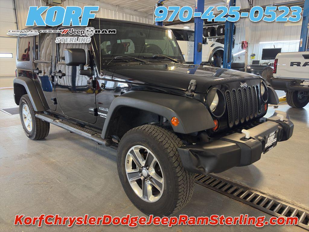 used 2011 Jeep Wrangler Unlimited car, priced at $13,494