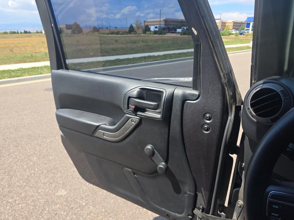 used 2014 Jeep Wrangler Unlimited car, priced at $12,493