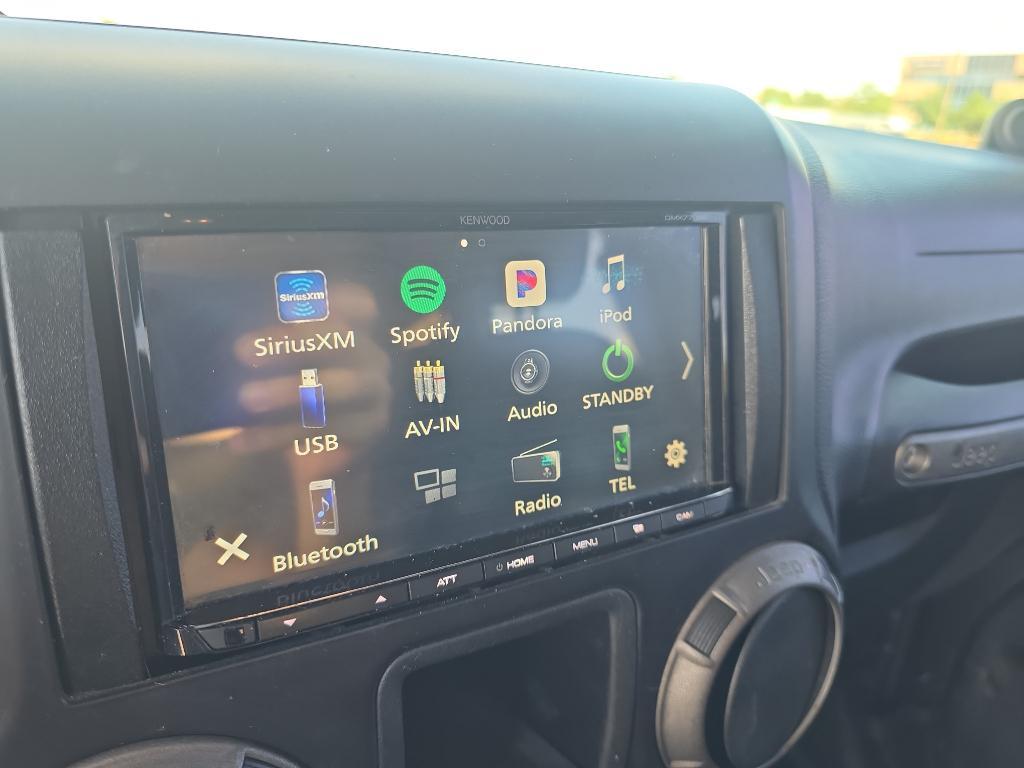used 2014 Jeep Wrangler Unlimited car, priced at $12,493