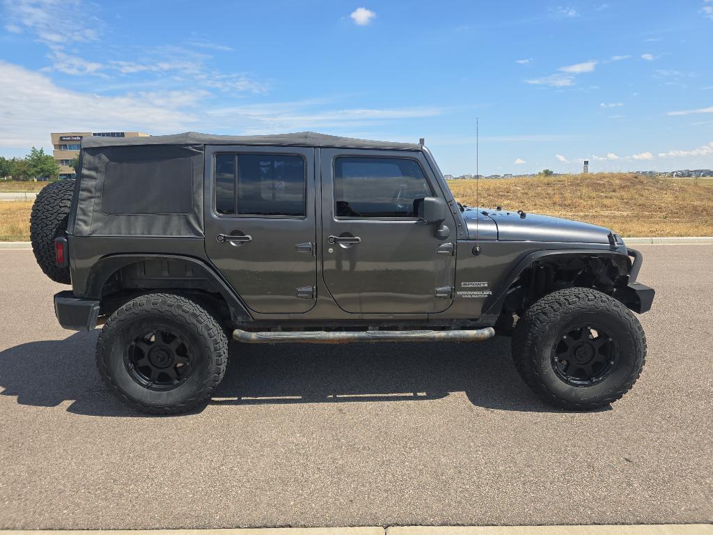 used 2014 Jeep Wrangler Unlimited car, priced at $12,493