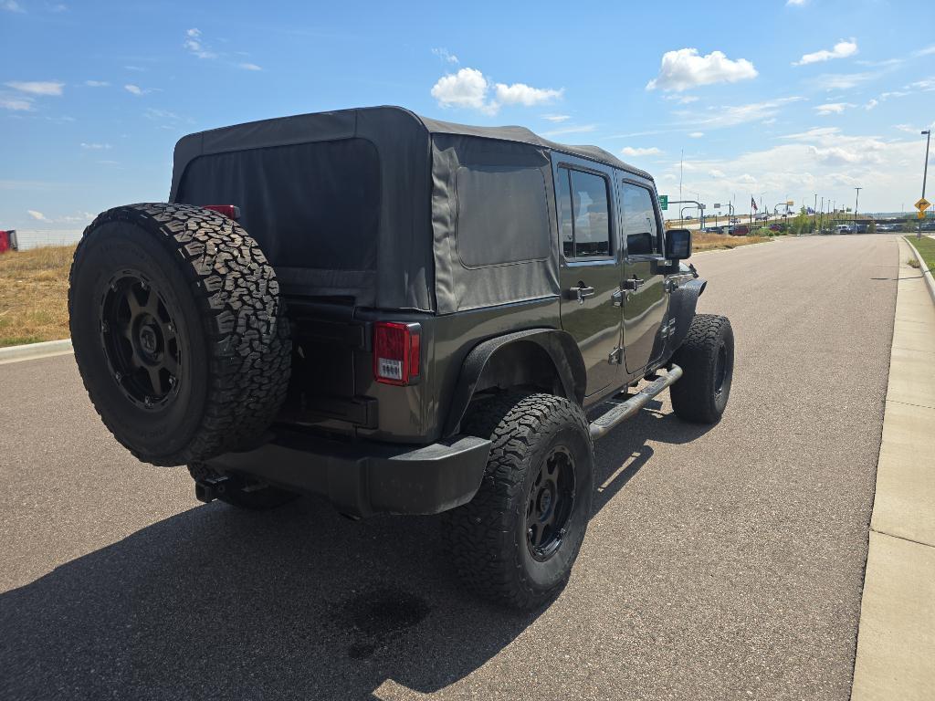 used 2014 Jeep Wrangler Unlimited car, priced at $12,493