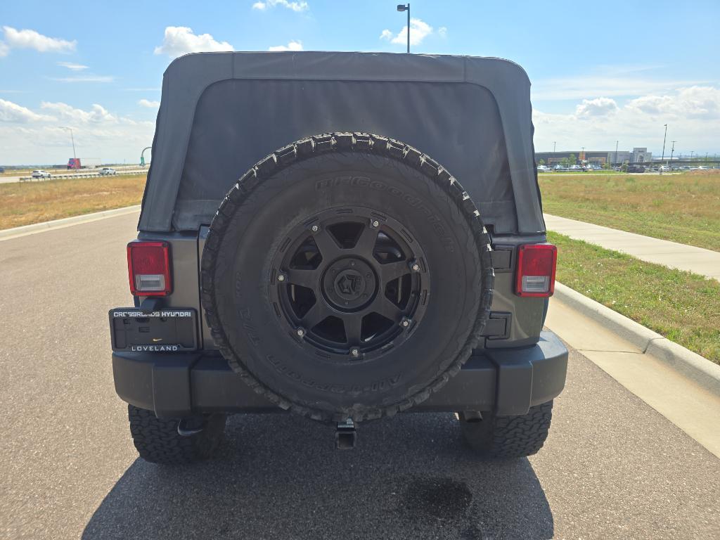 used 2014 Jeep Wrangler Unlimited car, priced at $12,493