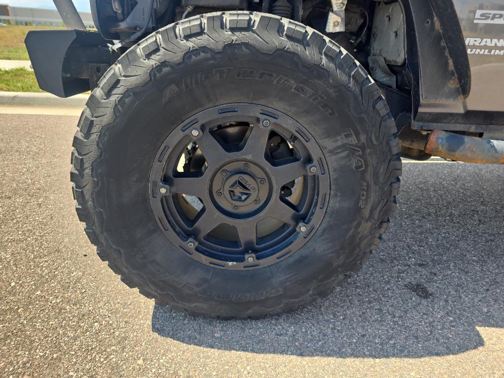 used 2014 Jeep Wrangler Unlimited car, priced at $12,493
