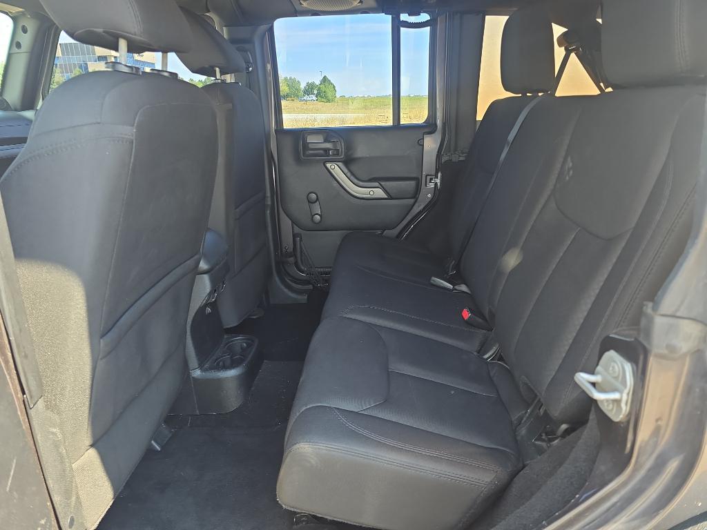 used 2014 Jeep Wrangler Unlimited car, priced at $12,493