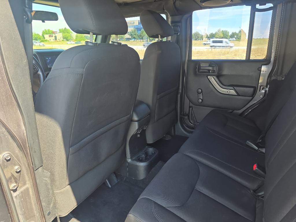 used 2014 Jeep Wrangler Unlimited car, priced at $12,493