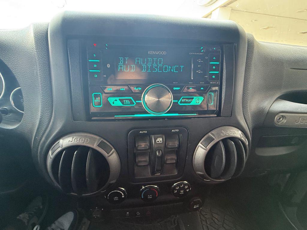 used 2015 Jeep Wrangler Unlimited car, priced at $18,450