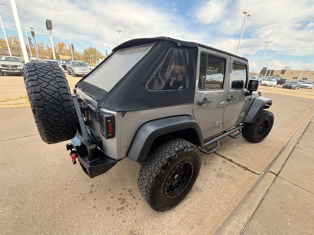 used 2015 Jeep Wrangler Unlimited car, priced at $18,450