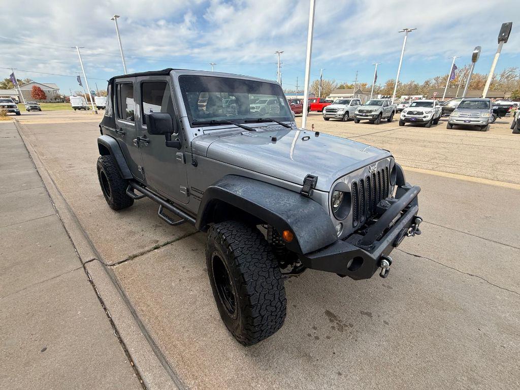 used 2015 Jeep Wrangler Unlimited car, priced at $18,450