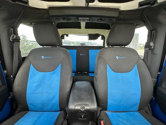 used 2015 Jeep Wrangler car, priced at $19,389