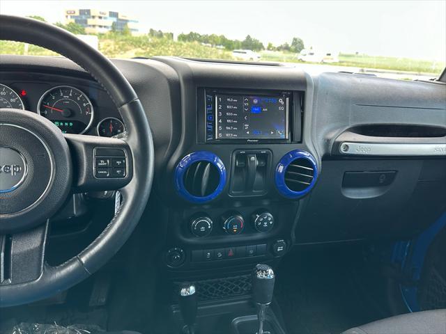 used 2015 Jeep Wrangler car, priced at $19,389