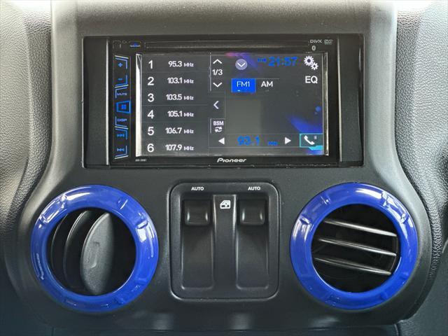 used 2015 Jeep Wrangler car, priced at $19,389