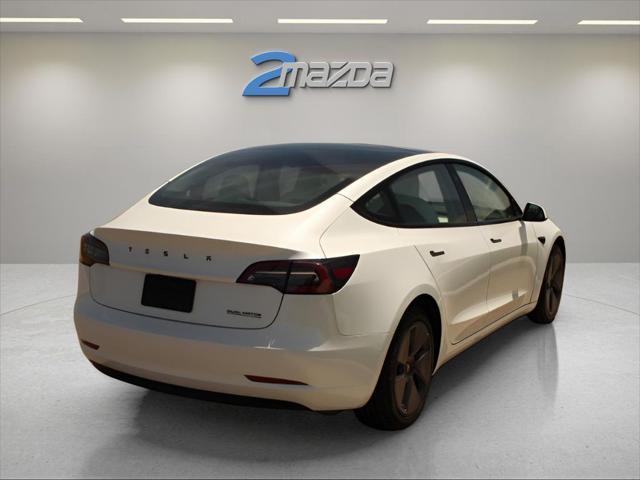 used 2023 Tesla Model 3 car, priced at $24,495