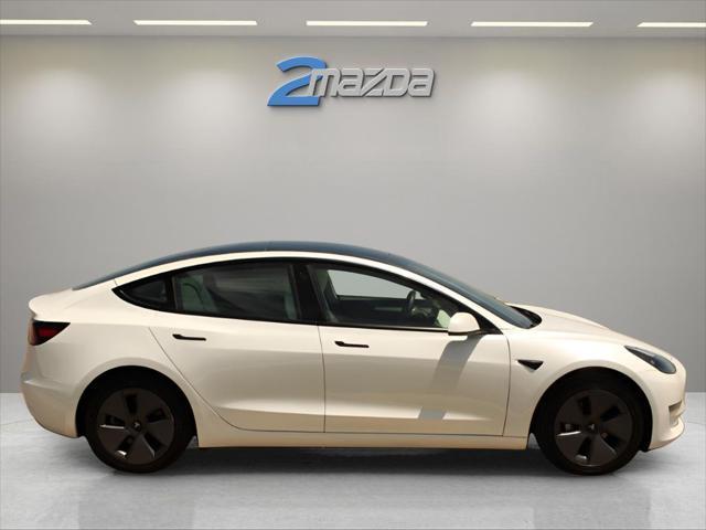 used 2023 Tesla Model 3 car, priced at $24,495