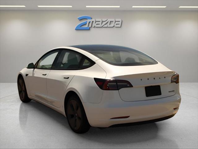 used 2023 Tesla Model 3 car, priced at $24,495