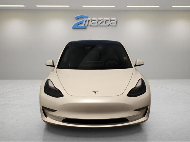 used 2023 Tesla Model 3 car, priced at $24,495
