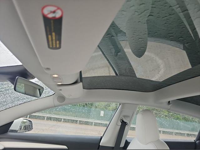 used 2022 Tesla Model 3 car, priced at $27,156