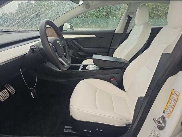 used 2022 Tesla Model 3 car, priced at $27,156