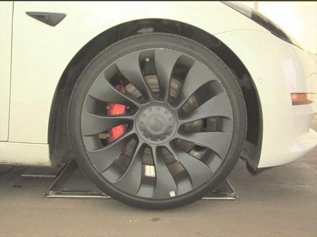 used 2022 Tesla Model 3 car, priced at $27,156