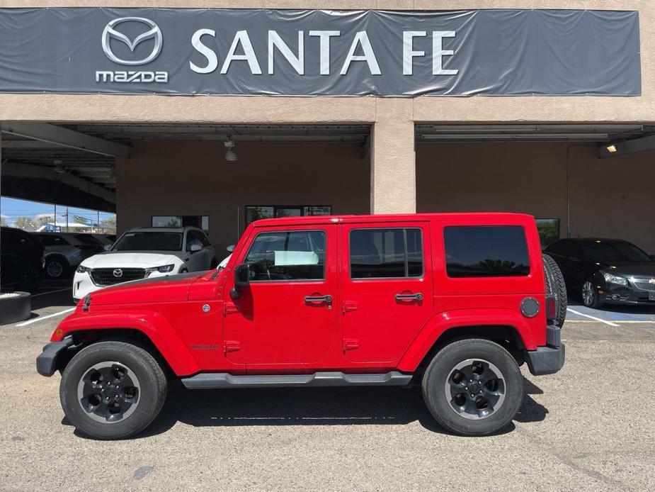 used 2014 Jeep Wrangler Unlimited car, priced at $21,590