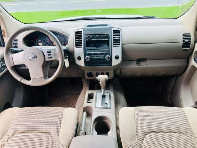 used 2010 Nissan Frontier car, priced at $12,990