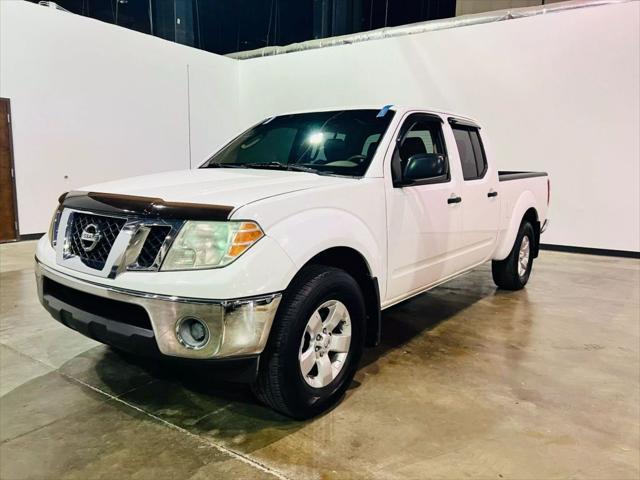 used 2010 Nissan Frontier car, priced at $12,990