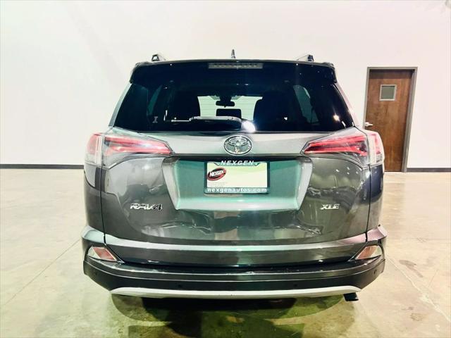used 2018 Toyota RAV4 car, priced at $19,890