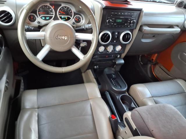 used 2010 Jeep Wrangler Unlimited car, priced at $13,900
