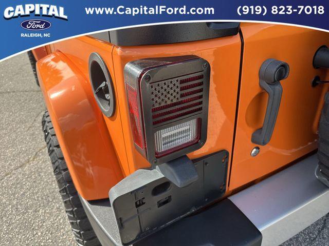 used 2013 Jeep Wrangler Unlimited car, priced at $14,893