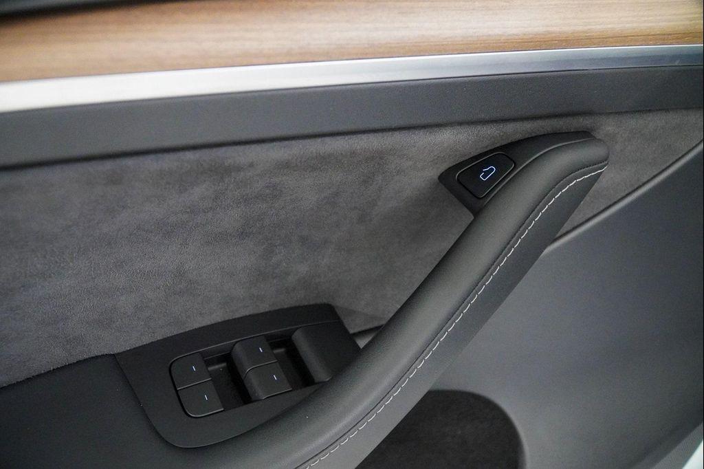 used 2023 Tesla Model Y car, priced at $33,298