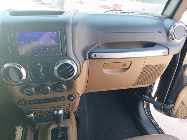 used 2015 Jeep Wrangler Unlimited car, priced at $18,191