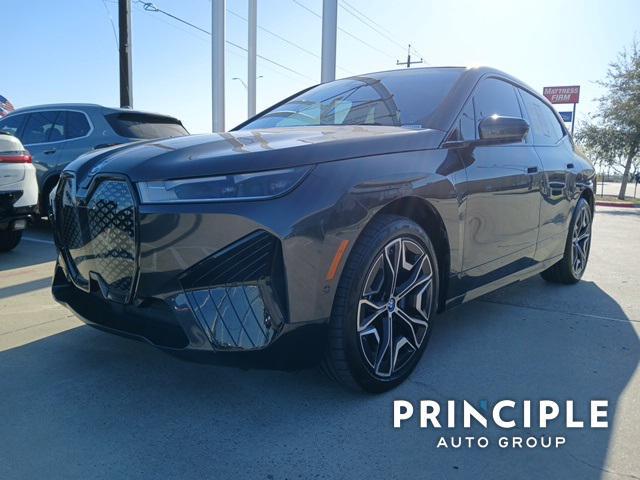 used 2024 BMW iX car, priced at $58,999