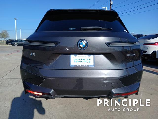 used 2024 BMW iX car, priced at $58,999